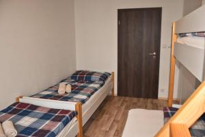 Postel nebo postele na pokoji v ubytování Apartmán198,cz