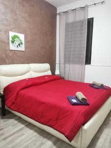 Säng eller sängar i ett rum på BED&FLY NEAR AIRPORT FONTANAROSSA reception h24
