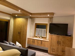 Телевизор и/или развлекательный центр в Haus Holzer