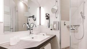 Koupelna v ubytování Hotel Ambiente