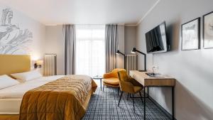 Postel nebo postele na pokoji v ubytování Hotel Ambiente + 36 fotografií