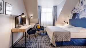 Postel nebo postele na pokoji v ubytování Hotel Ambiente