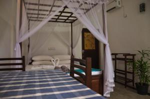 Voodi või voodid majutusasutuse Gem Light Guest House toas