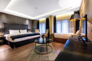 Voodi või voodid majutusasutuse Golden Gate Hotel Topkapı toas