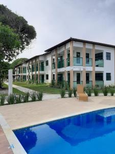Πισίνα στο ή κοντά στο Ilhéus North Residence