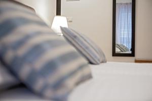 Posteľ alebo postele v izbe v ubytovaní Rooms Margarita