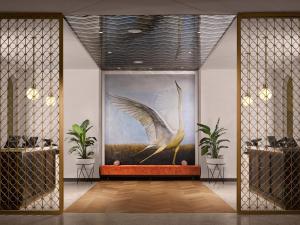 a room with a large painting of a bird at PGA National Resort in Palm Beach Gardens