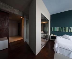 Postel nebo postele na pokoji v ubytování Hotel Locanda del Benaco