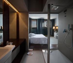 Postel nebo postele na pokoji v ubytování Hotel Locanda del Benaco
