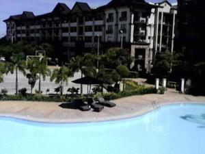 Bazén v ubytování ONE OASIS a1 SM MALL DAVAO FREE POOL WIFI nebo v jeho okolí