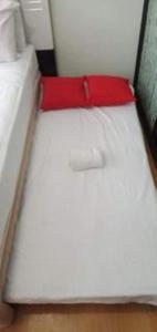 Postel nebo postele na pokoji v ubytování ONE OASIS a1 SM MALL DAVAO FREE POOL WIFI