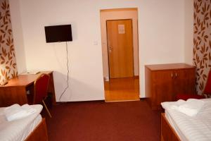 Posteľ alebo postele v izbe v ubytovaní LC - Hotel Ostrava