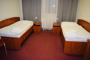 Posteľ alebo postele v izbe v ubytovaní LC - Hotel Ostrava