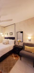 Postel nebo postele na pokoji v ubytování Hotel Santa Clara + 22 fotografií