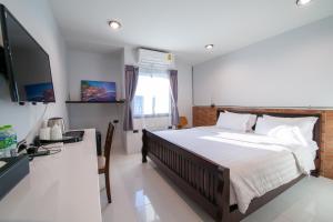 TV a/nebo společenská místnost v ubytování WE Terminal Hotel
