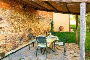 A patio or other outdoor area at Piccolo Borgo Gagnoni