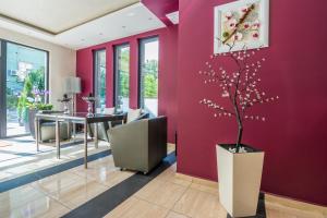 Uma área de estar em Hotel Calipso Hotel