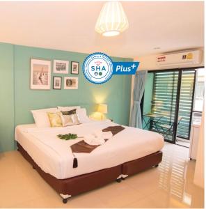 Pace Residence Pattaya 객실 침대