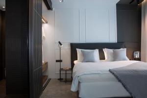 A bed or beds in a room at High-end Villa Faos Two