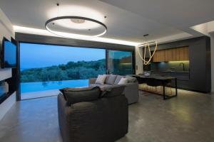 A seating area at High-end Villa Faos Two