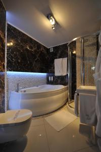 Kúpeľňa v ubytovaní Hotel Linder