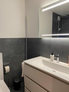 Koupelna v ubytování Ansàna + 11 fotografií