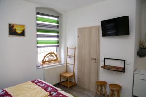 Postel nebo postele na pokoji v ubytování Gästezimmer Schmidt