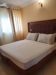 Postel nebo postele na pokoji v ubytování Fini Hotel Bobende