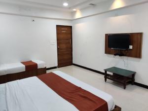 Rúm í herbergi á Hotel Nova Prime