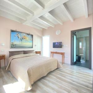 Postel nebo postele na pokoji v ubytování B&B Luce Cagliari