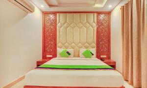 Treebo G K Residency Near Dehradun Railway Station客房内的一张或多张床位