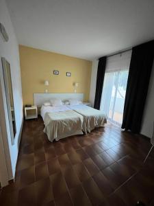 Posteľ alebo postele v izbe v ubytovaní Hotel Plaza Miami - Sólo Adultos