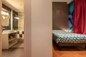 Ένα ή περισσότερα κρεβάτια σε δωμάτιο στο Appartement hyper centre ville historique 60 m2