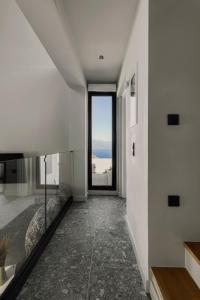 A bed or beds in a room at Aposperia Memorable Living