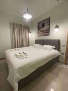 WUKELA APARTMENTS客房内的一张或多张床位