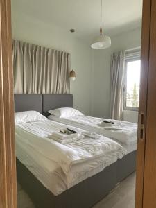 WUKELA APARTMENTS客房内的一张或多张床位