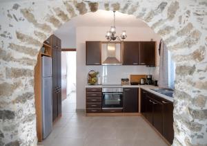 Kuchyň nebo kuchyňský kout v ubytování Yiayia's Place