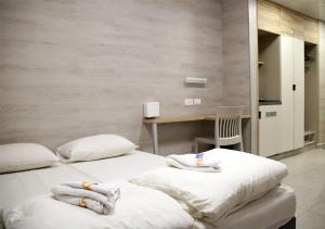מיטה או מיטות בחדר ב-אכסניית אנ''א רבין ירושלים