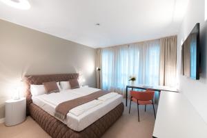 Cama ou camas em um quarto em Studiohouse Frankfurt