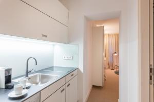 A cozinha ou cozinha compacta de Studiohouse Frankfurt