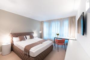 Cama ou camas em um quarto em Studiohouse Frankfurt