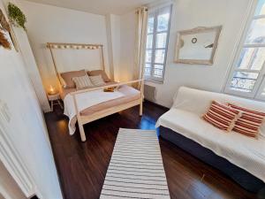 Säng eller sängar i ett rum på Charmant T3 calme au coeur du centre historique