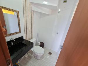 Ванная комната в Siri Mariscal Bombinhas C Piscina