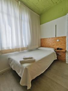 Postel nebo postele na pokoji v ubytování La Posada de El Chaflán