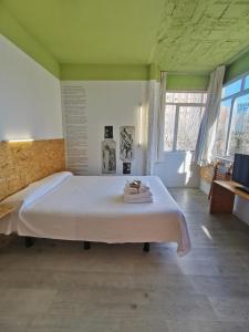 Postel nebo postele na pokoji v ubytování La Posada de El Chaflán