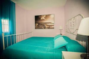Łóżko lub łóżka w pokoju w obiekcie Apartment Avenida Puig