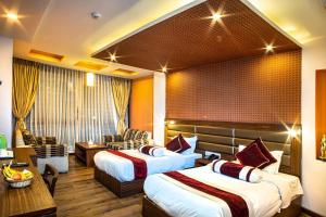 Katil atau katil-katil dalam bilik di The Address Kathmandu Hotel