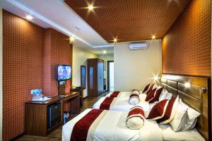 Katil atau katil-katil dalam bilik di The Address Kathmandu Hotel
