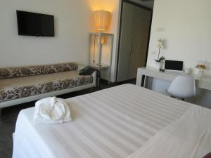 Postel nebo postele na pokoji v ubytování Hotel Joseph