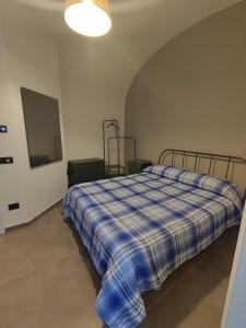 Posteľ alebo postele v izbe v ubytovaní CASA VACANZE - ANTICO CONVENTO